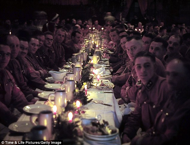 Spoils of war: Officers and cadets begin their dinner