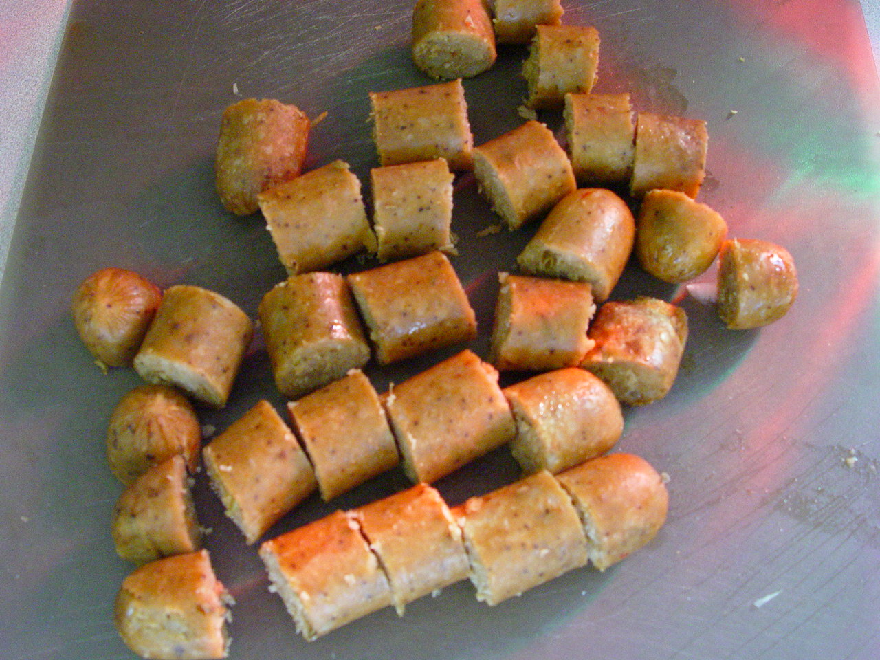 Making vegetarian sausage and peppers