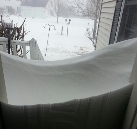 Picture out Colleen's window in New Hampshire... Snow drift are 24" and climbing!