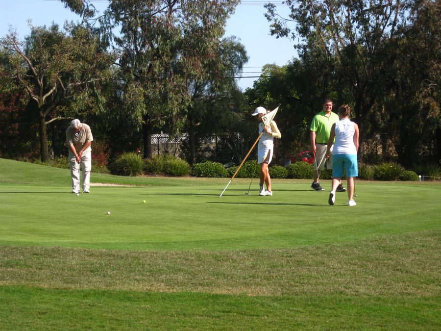 Sarah and Jon play gold at Old Ranch