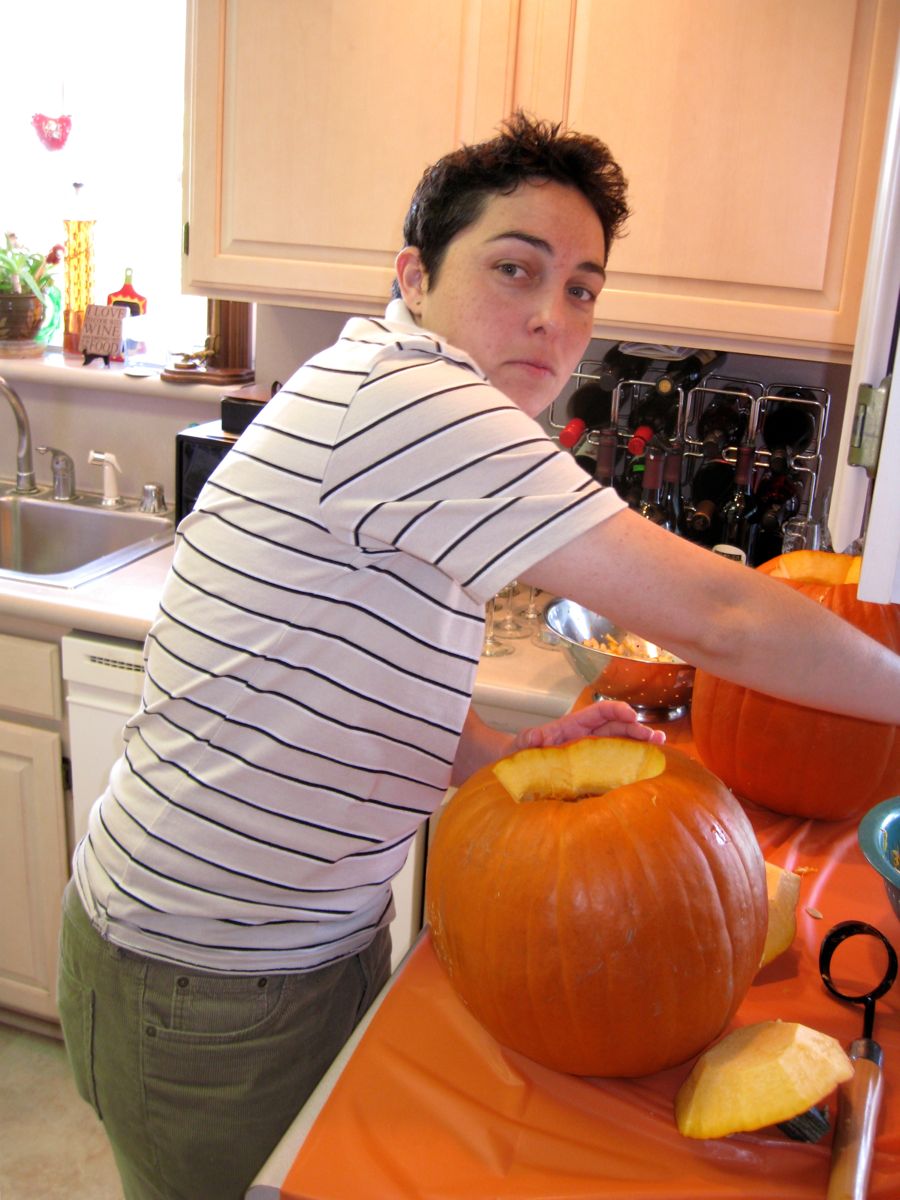 Carving the pumpkins with family at the Liles home