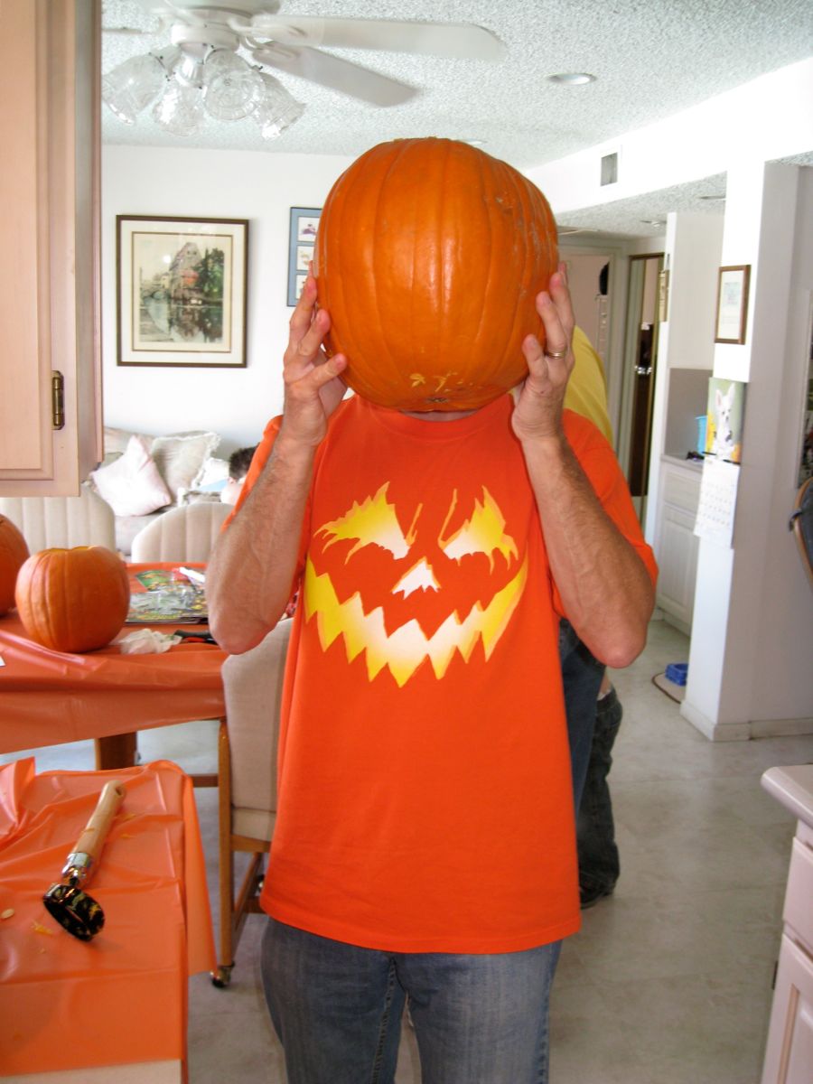 Carving the pumpkins with family at the Liles home