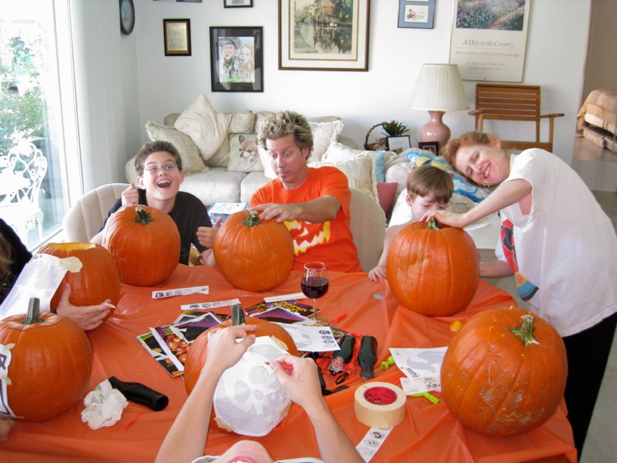 Carving the pumpkins with family at the Liles home