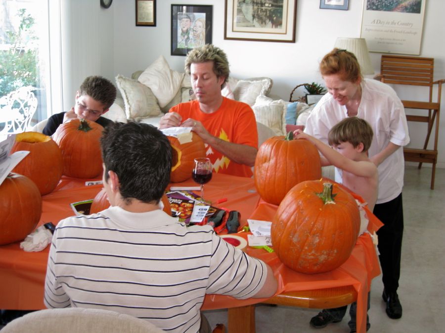 Carving the pumpkins with family at the Liles home