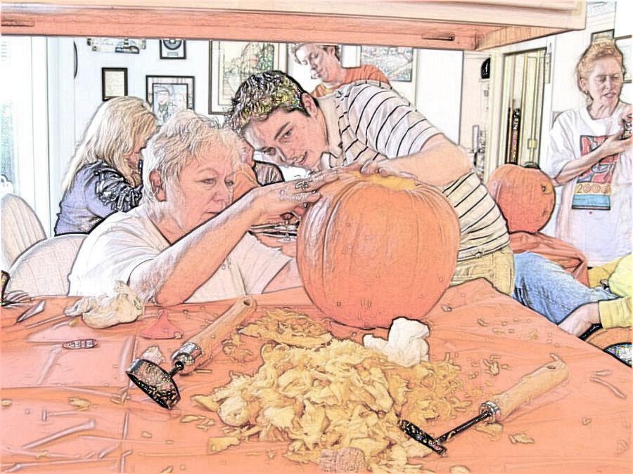 Carving the pumpkins with family at the Liles home