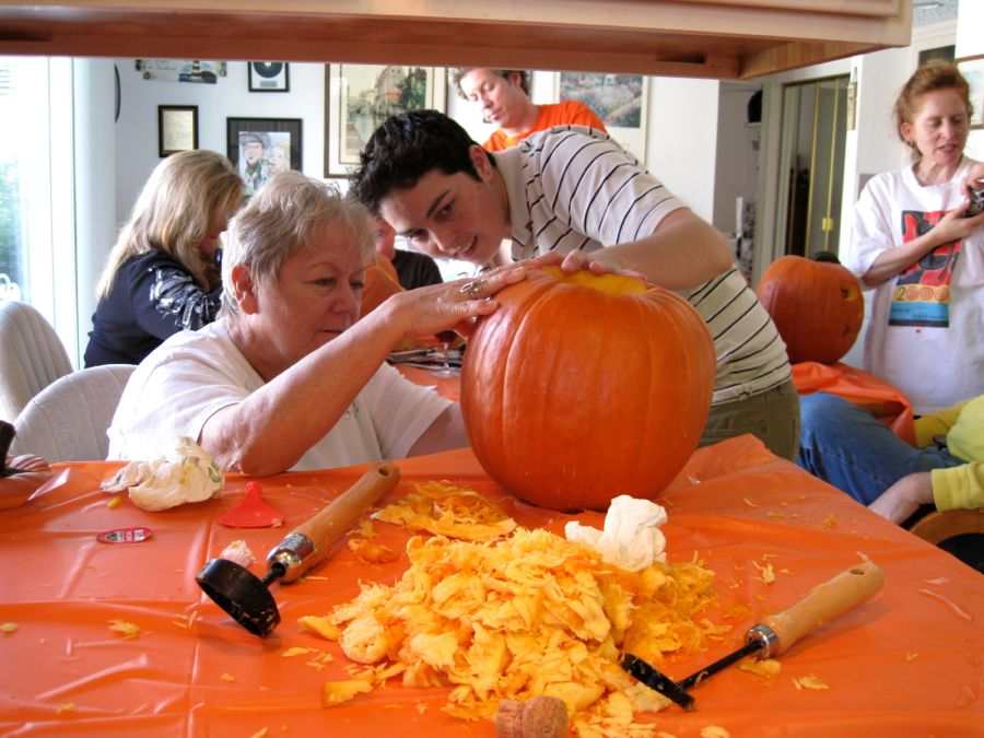 Carving the pumpkins with family at the Liles home