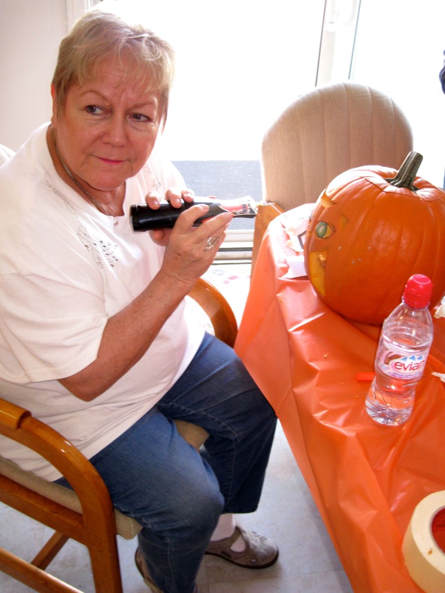 Carving the pumpkins with family at the Liles home