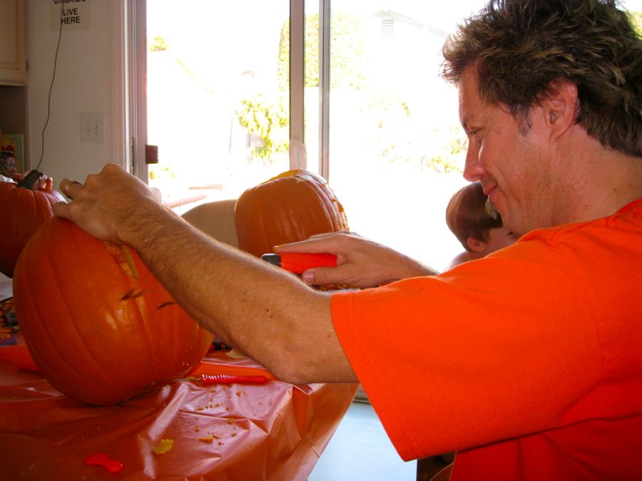 Carving the pumpkins with family at the Liles home