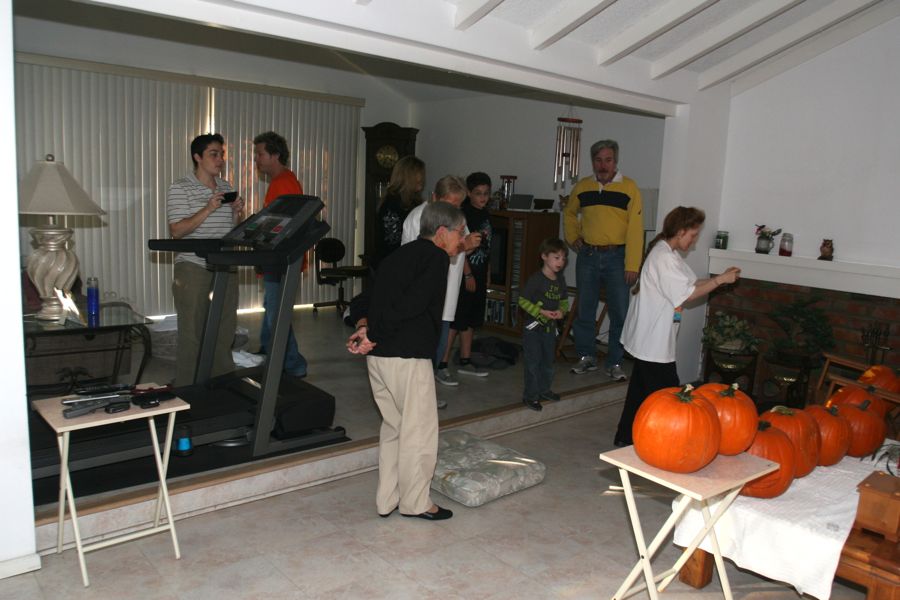 Carving the pumpkins with family at the Liles home