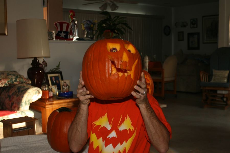 Carving the pumpkins with family at the Liles home