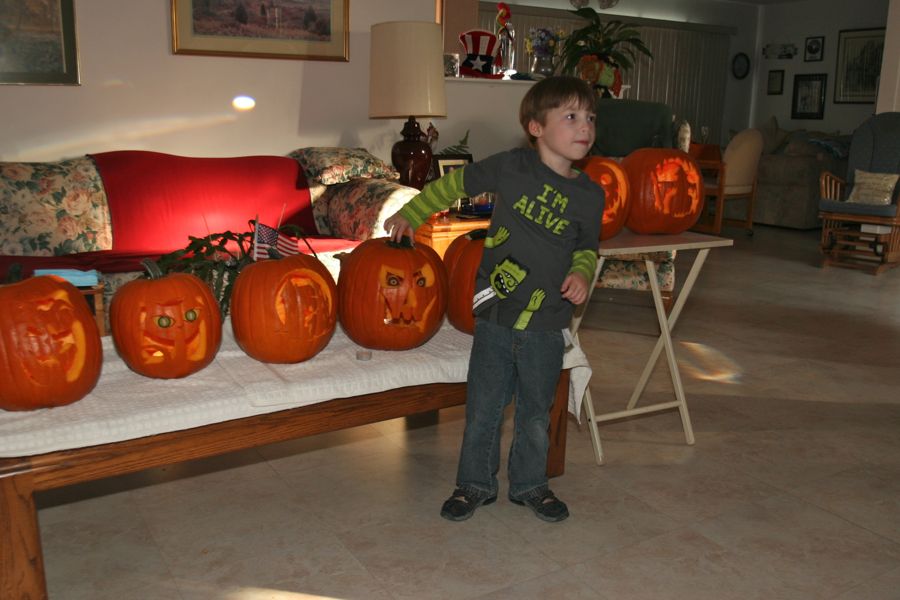 Carving the pumpkins with family at the Liles home