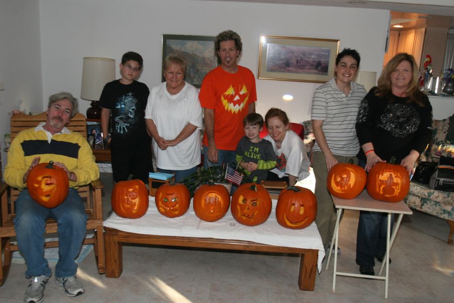 Carving the pumpkins with family at the Liles home