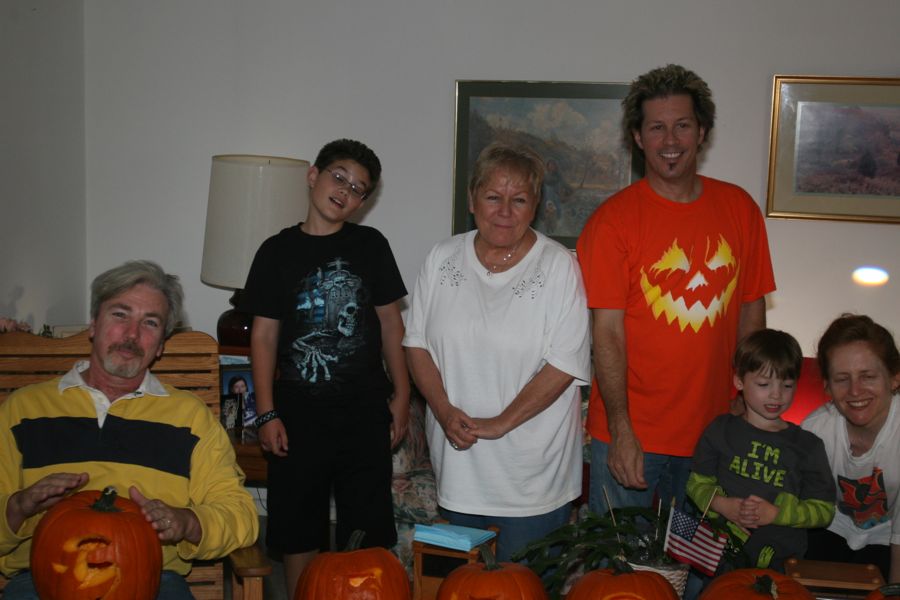 Carving the pumpkins with family at the Liles home