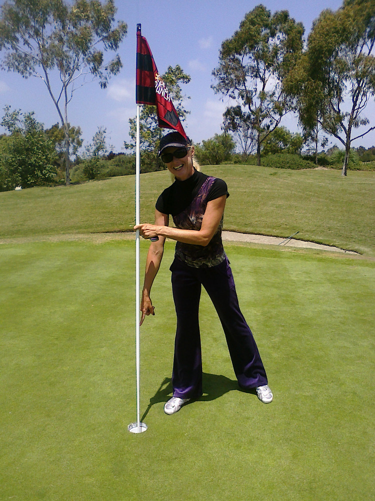 Charlotte makes a hole in one!