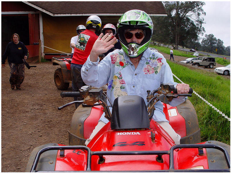 Sue rides the ATV