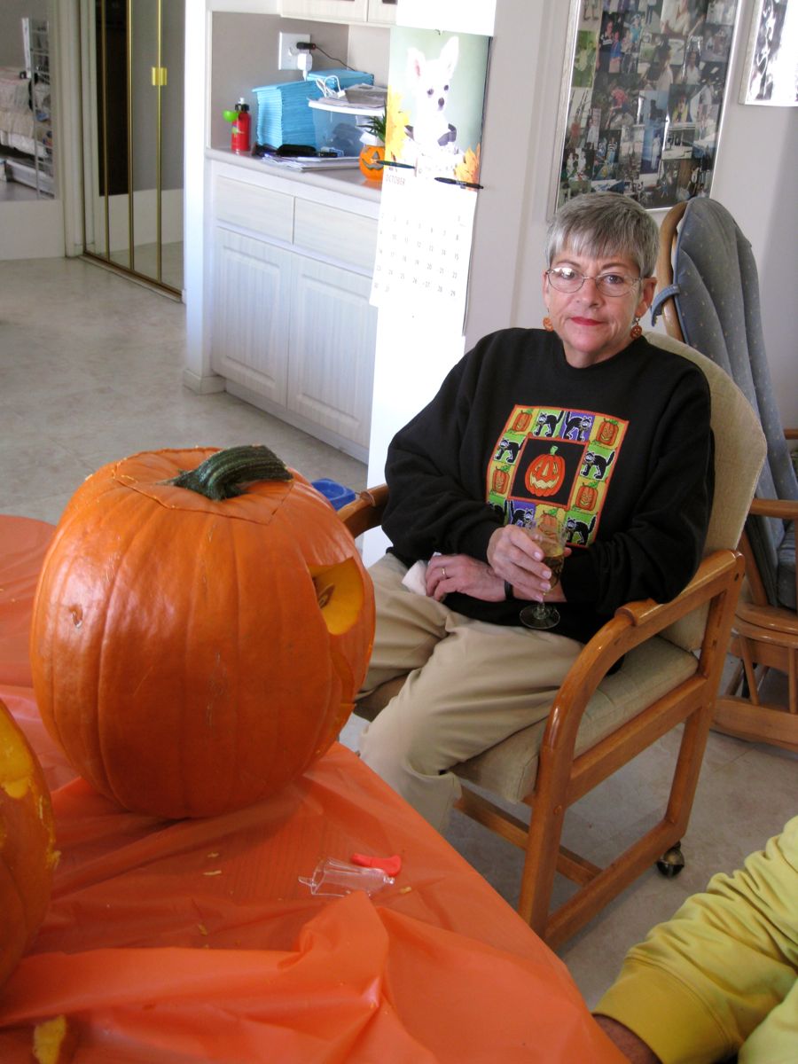 Carving the pumpkins with family at the Liles home